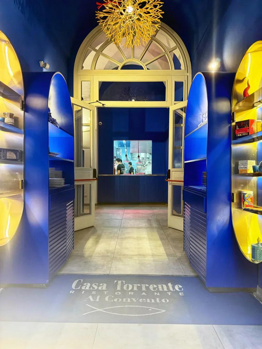 Entrance to Al Convento restaurant on the Amalfi Coast, showcasing stylish interior design.