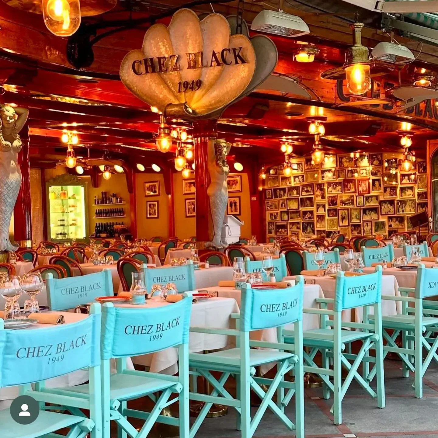 Chez Black restaurant in the Amalfi Coast, with elegant tables and chairs ready for diners.
