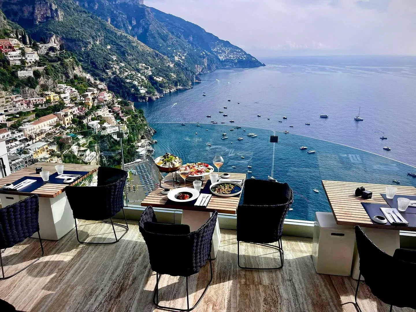 Restaurant seating at Li Galli with stunning views of the Amalfi Coast