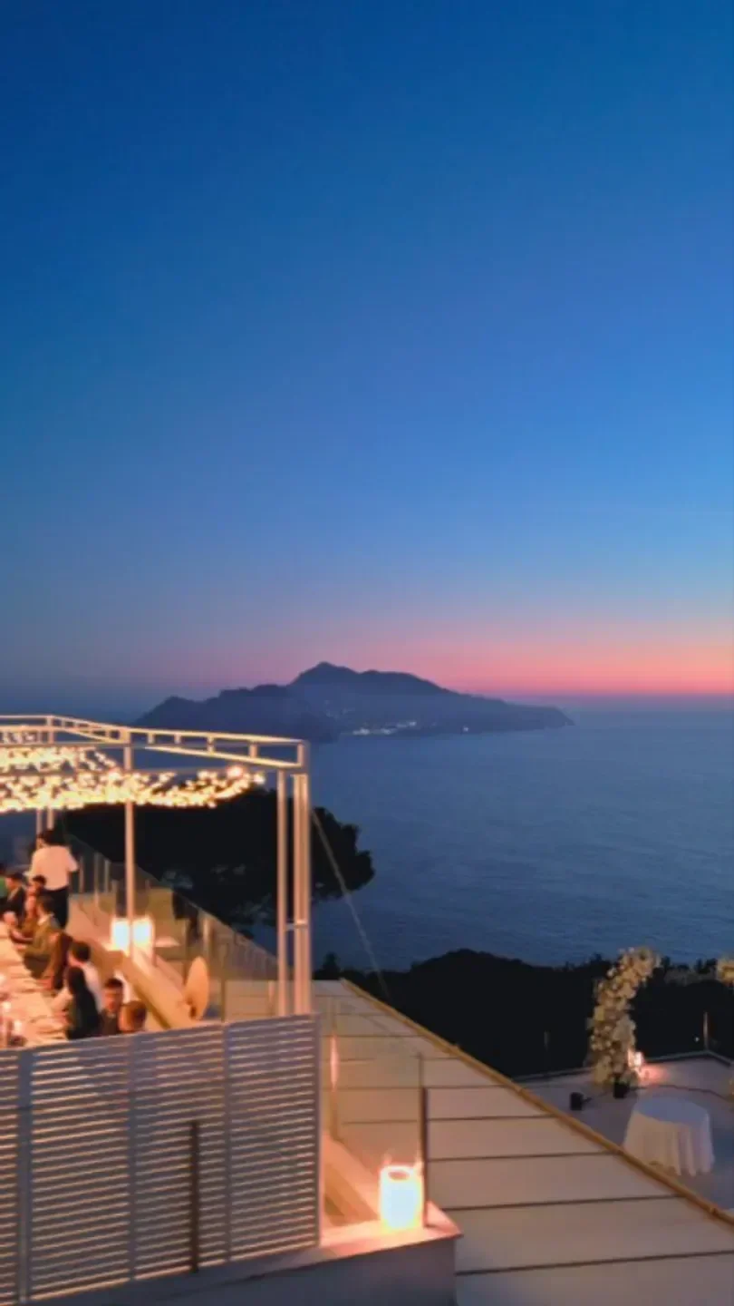 Relais Blu restaurant on Amalfi Coast at sunset with ocean views and dining