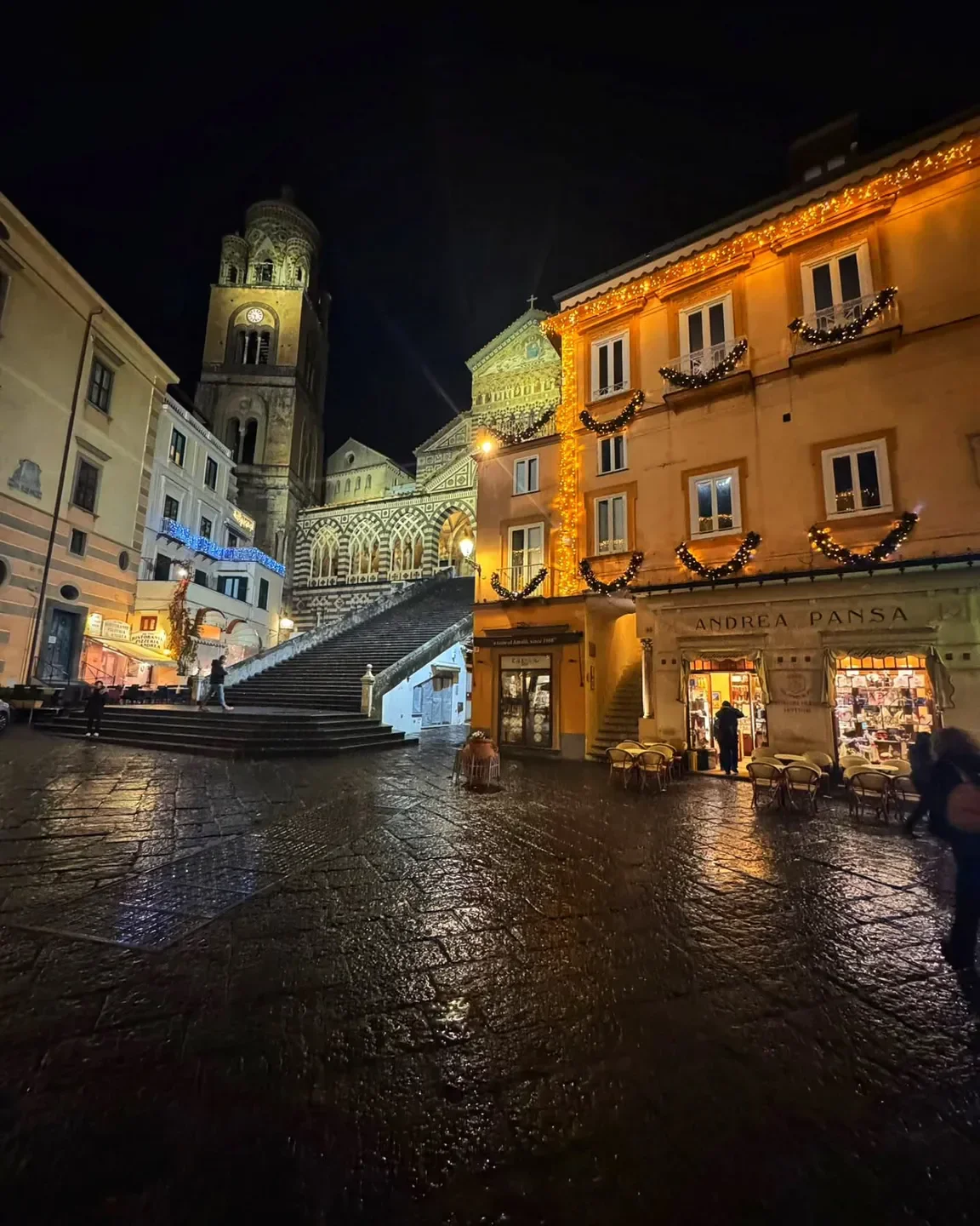 Night view of Sensi restaurant in Amalfi Coast, featuring illuminated architecture.